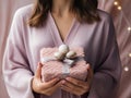 Delirious Woman Holding Gift in Knitted Sleeve Pastel - AI Generated Royalty Free Stock Photo