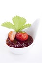 Deliscious strawberry jam with fresh fruits isolated