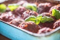 Delisious italian meal meat beef balls with basil in vintage roaster pan