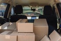 Deliver car have many boxes post in full back car