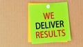 We deliver results written on green paper and pinned on corkboard, concept