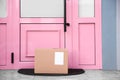 Delivered parcel on door mat Royalty Free Stock Photo