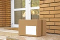 Delivered parcel on porch near door