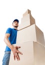 Deliverer keeps pile of cardboard boxes, bottom view