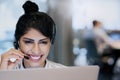 Delivering the best customer service experience as always. a young call centre agent working in an office.