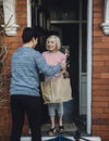 Delivering Groceries To The Elderly Royalty Free Stock Photo