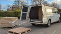 Delivering and unloading pallets of boxes out of a white van