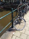 Delivery bicycle on a canal bridge Royalty Free Stock Photo