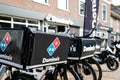 Delivery bikes of Domino`s restaurant