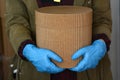 Delivery box with gloves. Royalty Free Stock Photo