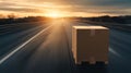 A delivery box on an open road at sunset, symbolizing logistics and transportation in a tranquil setting Royalty Free Stock Photo