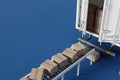 Delivery boxes move on a conveyor belt for logistics distribution, 3d rendering