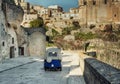 Delivery car in a beautiful Matera town, Italy Royalty Free Stock Photo