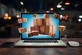 Delivery concept laptop screen displays packages ready for shipment Royalty Free Stock Photo