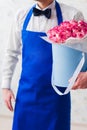 Delivery courier delivering flowers in a box