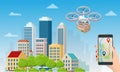 Delivery drone with the cardboard box flying over the town. Quadcopter carrying a package to customer. Technological Royalty Free Stock Photo