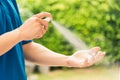 Delivery express courier young man use spray sterilize before giving boxes to woman customer receiving Royalty Free Stock Photo