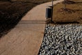 delivery of gray river pebbles like mulch to flower beds in the Royalty Free Stock Photo
