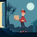 Delivery guy handing a box on doorway late night. Fast shipping to the door of your house. Delivery service concept Royalty Free Stock Photo