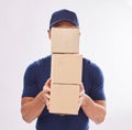 Delivery guy package, shipping boxes and export employee in studio with courier service. Box, supply chain and parcel Royalty Free Stock Photo