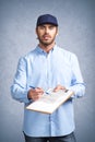 Delivery man ask to sign invoice Royalty Free Stock Photo