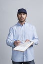Delivery man ask to sign invoice Royalty Free Stock Photo