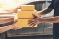 Delivery man delivering holding parcel box Royalty Free Stock Photo