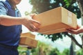 Delivery man delivering holding parcel box Royalty Free Stock Photo