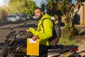 Delivery man with documents to be delivered from the destination