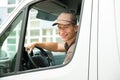 Delivery Man Driving Van Royalty Free Stock Photo