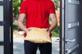 Delivery man giving a package Royalty Free Stock Photo