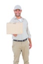 Delivery man giving package on white background Royalty Free Stock Photo