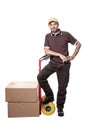 Delivery man with handtruck and parcel