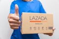 Delivery Man with Lazada box thumbs up, Popular online shopping mall in Thailand,