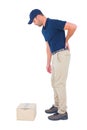 Delivery man suffering from backache on white background