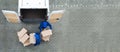 Delivery Men Unloading The Cardboard Boxes Royalty Free Stock Photo