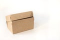 Delivery, moving and recycling concept. Cardboard box isolated on white background side view. mock up Royalty Free Stock Photo