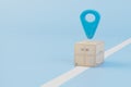 delivery of parcels to the specified address. Parcel and GPS point on a blue background. 3D render Royalty Free Stock Photo