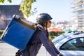 delivery person riding electric bicycle