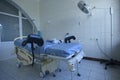 Delivery room of a maternity hospital, obstetric bed, lamp, medical equipment set