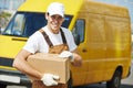 Delivery service man with parcel box Royalty Free Stock Photo