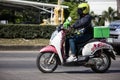 Delivery service man ride a Motercycle of Grab Food