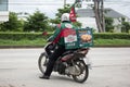 Delivery service man ride a Motercycle of The Pizza Company. Royalty Free Stock Photo