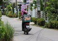 Delivery service man ride a Motercycle of The Pizza Company Royalty Free Stock Photo