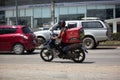 Delivery service man ride a Motercycle of Pizza Hut Company. Royalty Free Stock Photo