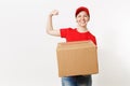 Delivery strong woman in red uniform isolated on white background. Female in cap, t-shirt courier or dealer showing