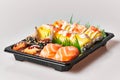 Delivery tray of sushi food isolated on white background Royalty Free Stock Photo