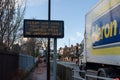 A truck drives past a sign warning of new Clean Air Zone (CAZ) charges in Newcastle upon Tyne, UK Royalty Free Stock Photo