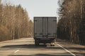 Delivery truck driving on a highway. car moving on a roadway Royalty Free Stock Photo