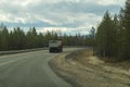 Delivery truck driving on a highway. car moving on a roadway Royalty Free Stock Photo